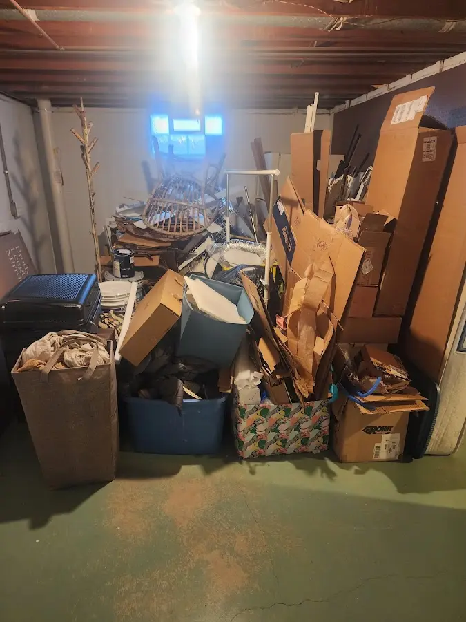 Roll-off dumpster container at job site for 4 Yard Dumpster Rental in Picayune